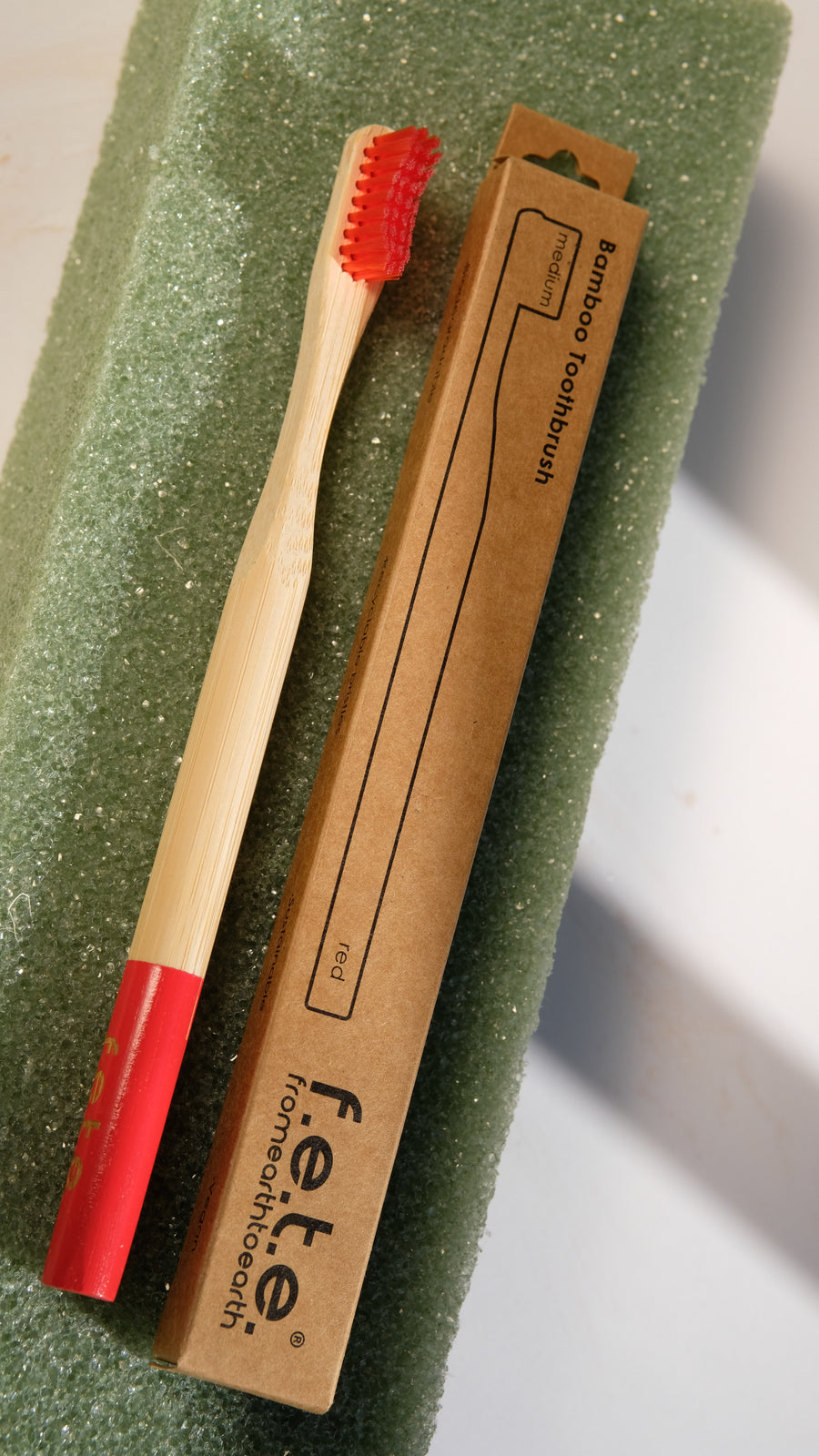 F.E.T.E. Medium Bamboo Toothbrush in Red