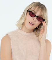 Woman wearing Nava Triangle Sunglasses by Matt & Nat